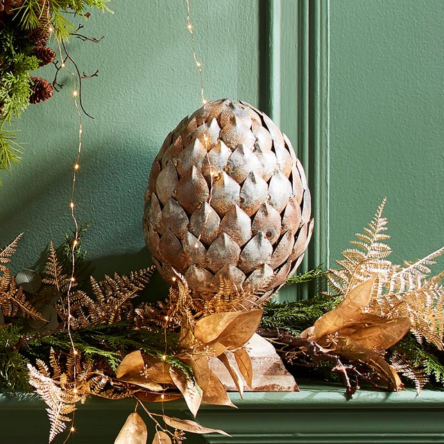 A classic ornament, this artichoke is a fresh take, a weathered metal rendition. Perfect for that casual space adding...