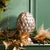 A classic ornament, this artichoke is a fresh take, a weathered metal rendition. Perfect for that casual space adding...