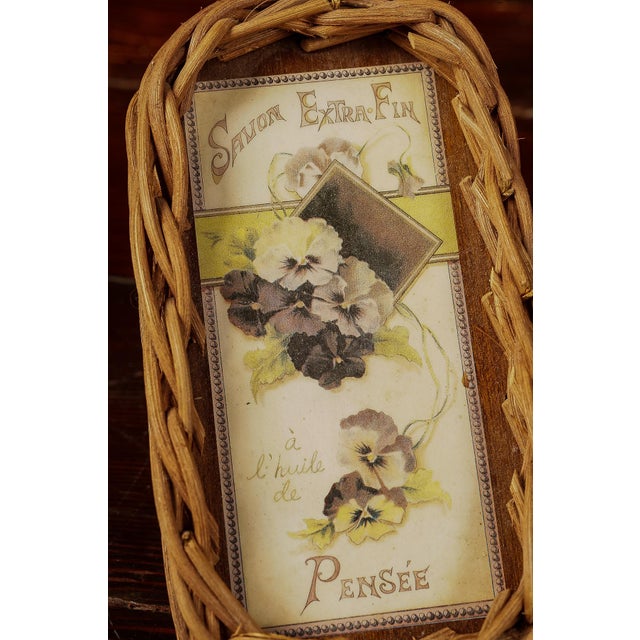 This vintage trinket dish is made from woven fibrous material shaped to form a basket. This trinket dish features a...