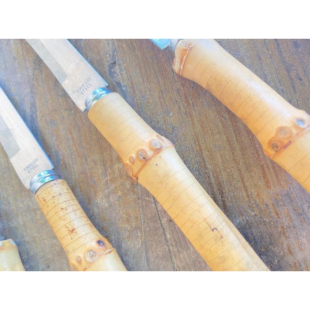 A great set of six small cheese knifes with stainless steel blade and real natural bamboo handles, circa early to mid-20th...