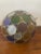 Very decorative lamp in the shape of a ball with facets in Glass of different colors round.