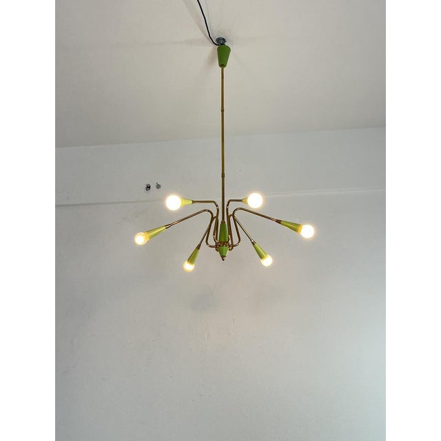 Mid-Century 6-light brass chandelier in the style of Oscar Torlasco, 1950s Intact and in good condition, E14 lamps. This...