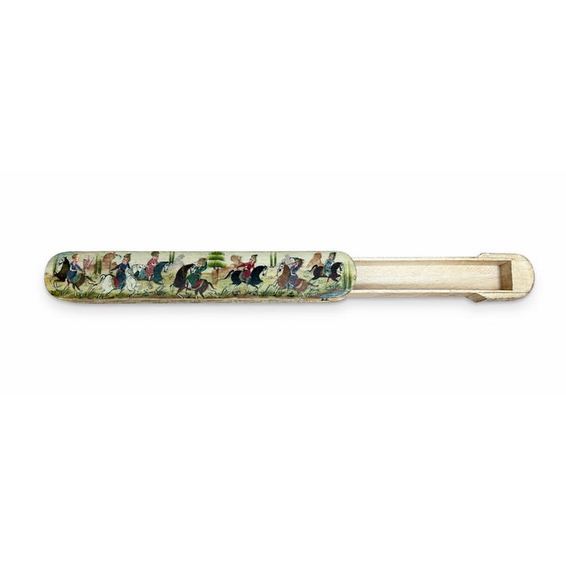 A beautifully decorative vintage Persian-style lacquer qalamdan, or calligraphy pen box, featuring a hand-painted...