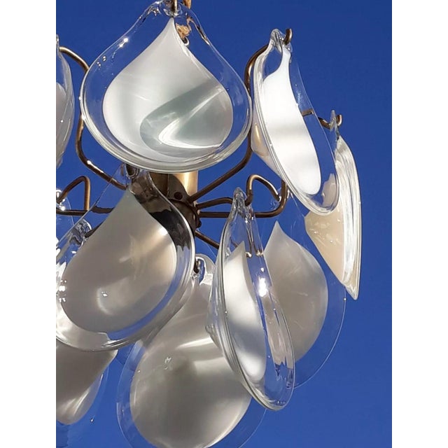 VISTOSI Italy 70s Sputnik lamp Object: Pendant / ceiling lamp 16 arms 1xE27 Age: circa 1970s Color/Material: Metal Gold...