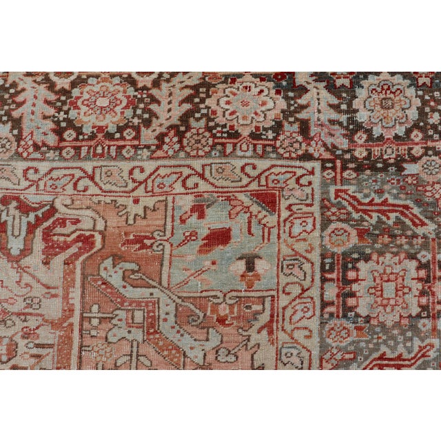 Measures: 9'7 x 12'10 Antique Persian Heriz Rug with Central Medallion in Red and Blue 9'7 x 12'10. Keivan Woven Arts/...