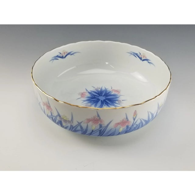 A wonderful and rare to find centerpiece or large serving bowl by one of Japan's finest porcelain manufacturers, Otagiri....