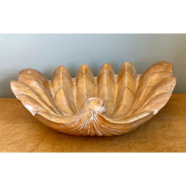 This vintage bowl is a sculptural study in organic form, hand-carved from a single richly grained piece of wood into the...