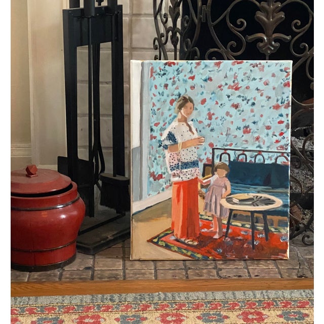 A beautiful print of a mother and child in the foreground of a floral patterned interior space.