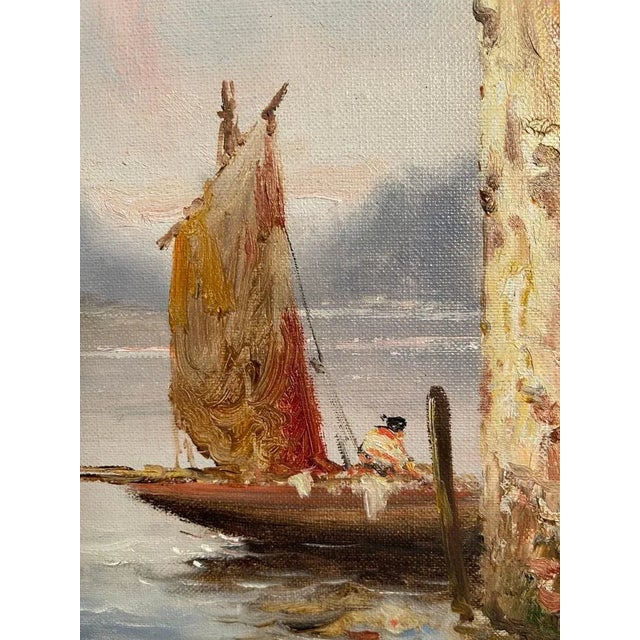 A charming glimpse of a lake view created and signed by Francesco Mancini (1830-1905). It depicts a moored boat in the...