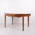 Oval dining table made in Danish design in the 1960s. Crafted in rosewood with pronounced grain. The table features...