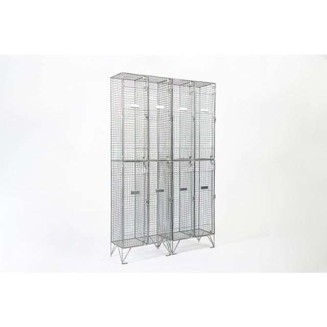 Pair of British industrial open wire mesh metal storage locker sets made in the United Kingdom. Two tall freestanding...