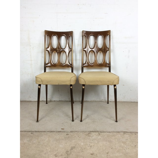This pair of mid century modern accent chairs by Chromcraft feature smoked lucite seat backs, vintage tweed upholstered...