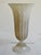 A tall fluted glass vase. The Scavo technique has whitish flecks scattered across beige undertones. Italian from the 60’s/...