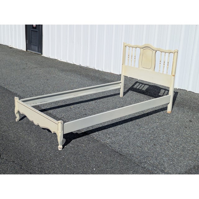 Elevate your bedroom with this stunning 1960s Dixie Furniture Twin Bedframe, a true masterpiece of Vintage French...
