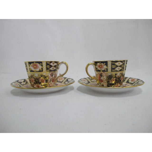 Gorgeous Royal Crown Derby bone china tea cup and saucer pair (includes 2 cups and 2 saucers) with scalloped rims, in...