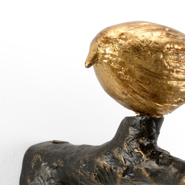Featuring an antique gold finished songbird on a bronze finished branch, tweet ii is the perfect wall decor to add to a...