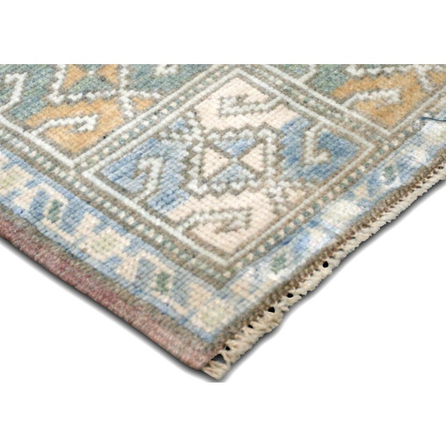 Experience the timeless beauty and quality of our Vintage Turkish Oushak Yastic rug. Handwoven with intricate designs,...