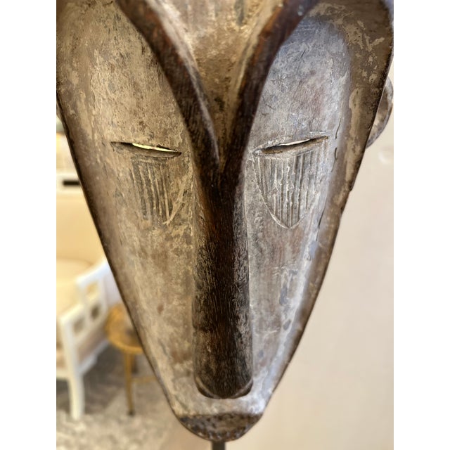 1980s Collection of African Carved Wood Masks on Tall Custom Iron Stands For Sale - Image 5 of 16