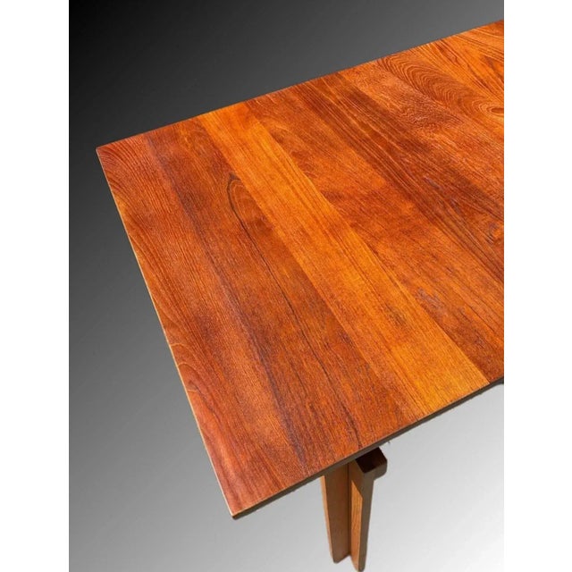 This table is in good vintage condition. Danish teak extending dining table Model FD542 designed by Inger Klingenberg for...