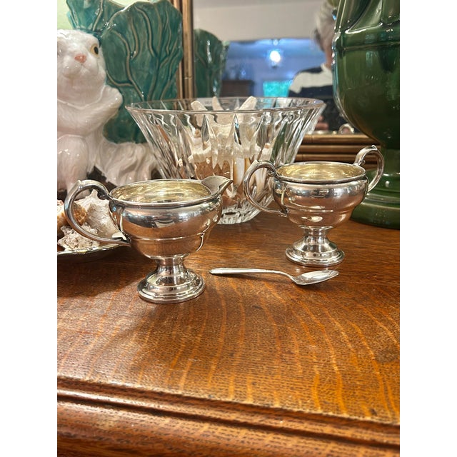 A beautifully proportioned vintage sterling silver open sugar and creamer set, crafted in the elegant streamlined style of...