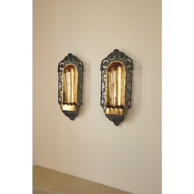 Pair of Swedish Grace Candle Wall Scones in Brass ascribed to Arvid Böhlmarks Lampfabrik, Sweden, circa 1920s. An outer...