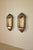 Pair of Swedish Grace Candle Wall Scones in Brass ascribed to Arvid Böhlmarks Lampfabrik, Sweden, circa 1920s. An outer...