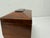 This elegant English tea caddy is crafted from rich mahogany, showcasing the warm tones and fine grain of the wood,...