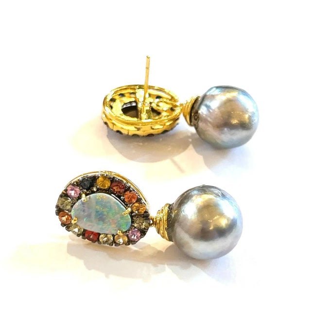 This is part of Chairish’s Fine Jewelry assortment. Natural Blue Opal- 4.00 carat Multi color sapphires - 2.50 carat South...