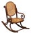 Antique Vienna Secession Bent Oak & Cane Scrolling Children Sized Rocking Chair, Thonet For Sale