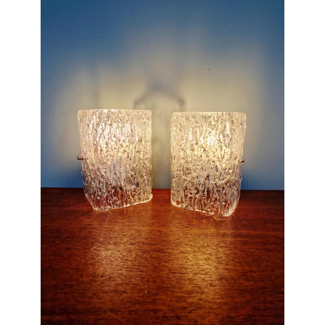 Pair of textured frosted glass wall sconces, produced by the austrian manufacturer j.t. Kalmar in the 1960s-70s. each...