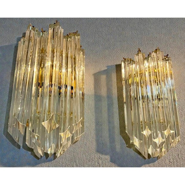 A beautiful pair of original Paulo Venini - Novaresi wall lamps made of Murano crystal glass and brass. They were made in...