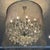 A shimmering veil of ball chain adds an industrial touch to the Victorian design of our opulent crystal glass and iron...
