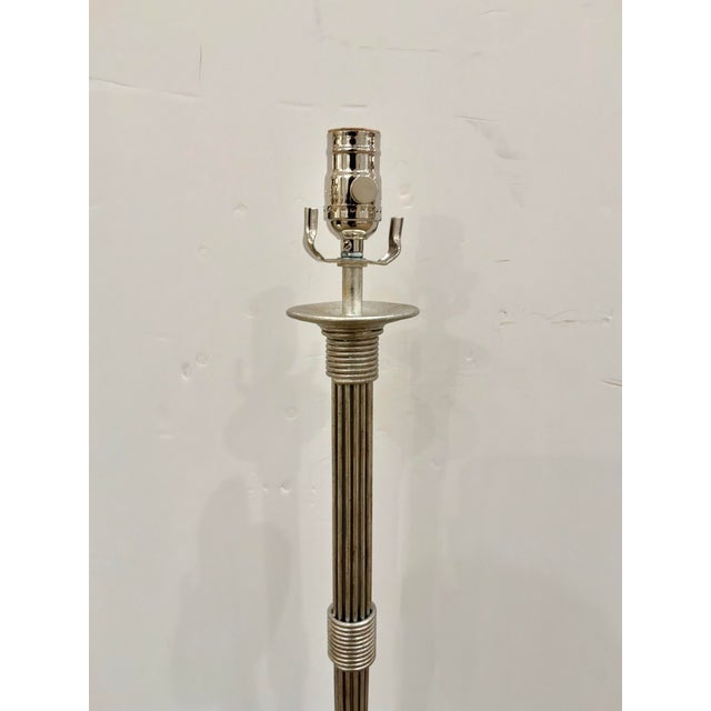 Stylish Currey & Co Reeded Candlestick body Lamp. Silver leaf finish on acrylic base. Showoom floor sample.