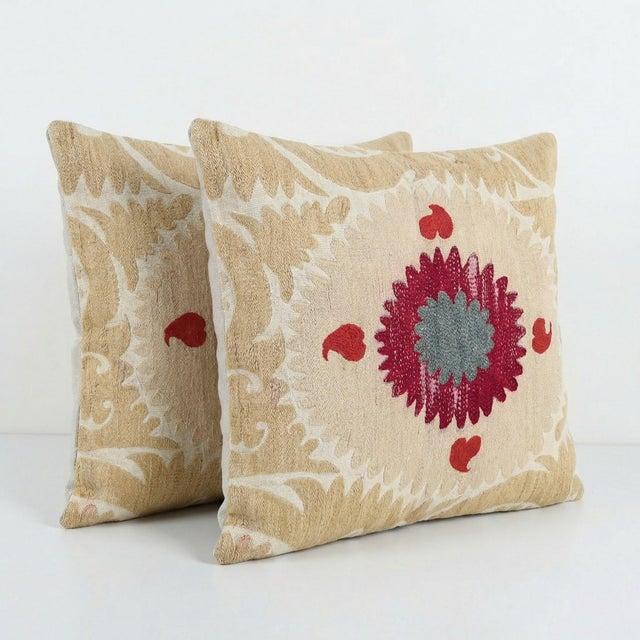 This beautiful 21'' x 28'' & 24'' x 28'' hand-embroidered Suzani pillow cover set was made from authentic Uzbek cotton...
