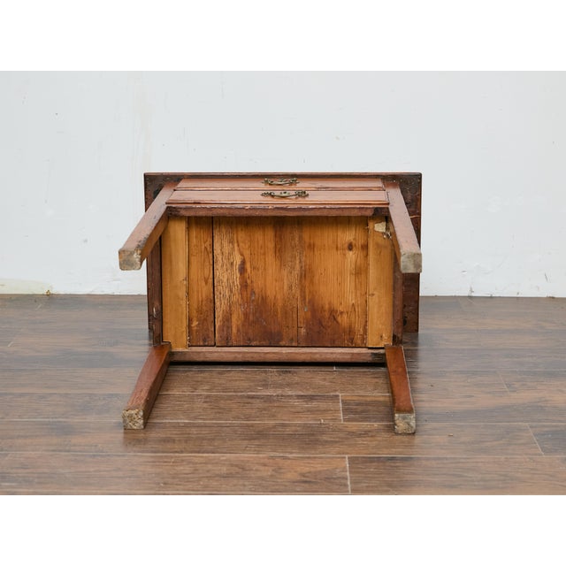 This 19th-century English pine table captures the warmth of aged wood with its beautifully worn patina and time-softened...