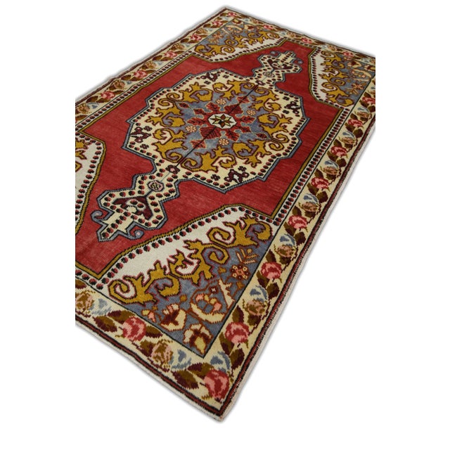 Introducing a one-of-a-kind vintage Turkish hand-knotted wool rug, carefully crafted by skilled artisans using traditional...