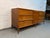 Introduce timeless sophistication to your space with this stunning 1960s Mid-Century sculptural walnut dresser—a perfect...