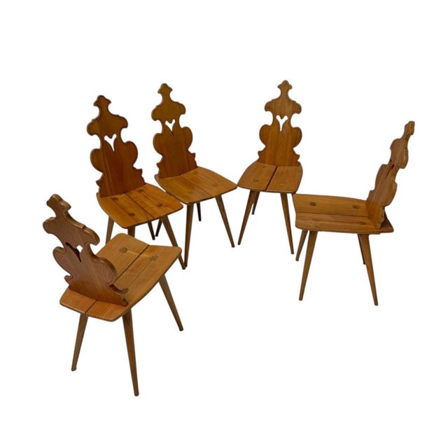 Stunning and elegant set of five Brutalist Tyrolean or Swiss Mountain chairs. Striking design from the Tyrol region of the...