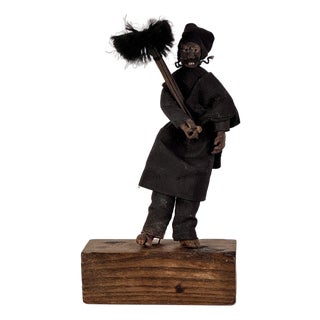 Early 20th Century Primitive "The Chimney Sweeper" Clay Figure on Stand For Sale