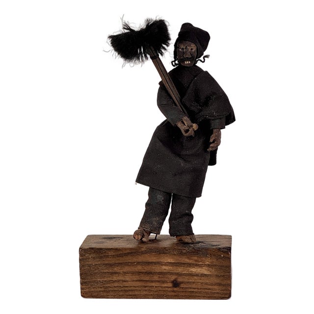 Early 20th Century Primitive "The Chimney Sweeper" Clay Figure on Stand For Sale