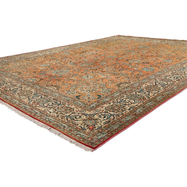 75612 Vintage Persian Tabriz Rug, 10'00 x 13'03. A marvel of woven poetry, this hand-knotted wool vintage Persian Tabriz...