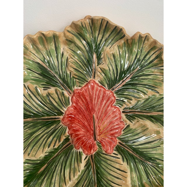 Vintage, tan majolica serving platter with sculpted borders and a center decoration of a dark pink calla flower. Hand...