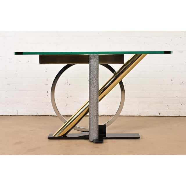 An exceptional sculptural Postmodern console table By Kaizo Oto for Design Institute of America USA, Circa 1980s Steel,...