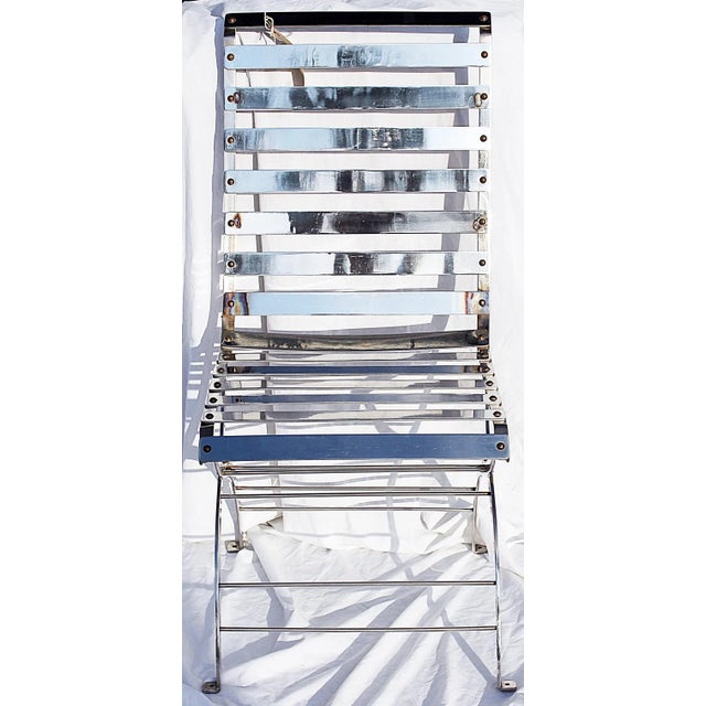 Here's an amazing one-off handmade original Edmund Szilagyi polished stainless-steel side chair, cut slates riveted to...