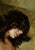 This intimate oil painting captures a figure in a moment of quiet introspection, with soft, flowing brushstrokes that...