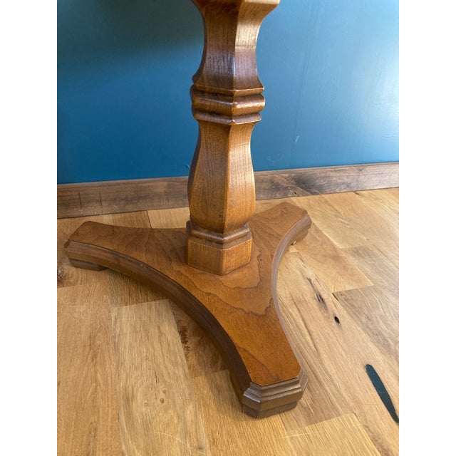 This vintage hexagonal accent table combines classic form and elegant detail, making it a standout piece for any setting....