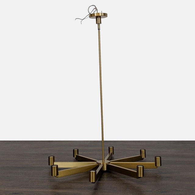 Brighten your home with this stylish 8-light chandelier from Kuzco Lighting. The elegant brushed brass finish and...