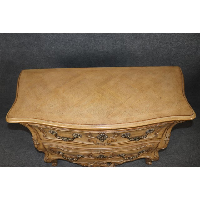 This exceptional pair of commodes by Auffray & Company represents the finest traditions of French-inspired luxury...