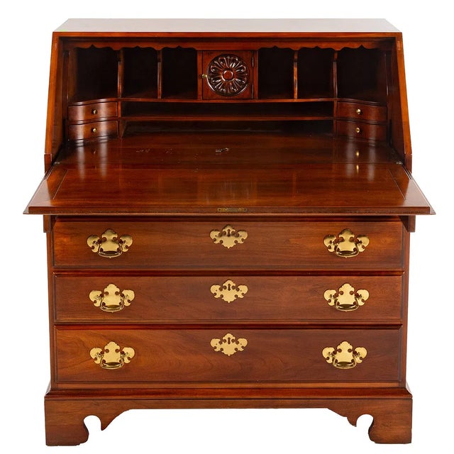 Georgian style slant front desk by Statton. Part of the Americana line. Fall-front opening to a fitted interior. Four...