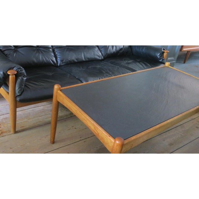 Unusual mid century coffee table with a slate top on a solid oak base, designed by Eric Merthen, Sweden 1960s. I have...